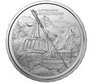 Канатная дорога на вершину горы Шилтхорн на серебряных 20 франках. Швейцария