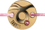 Золотая монета «Телец» украшена розовым кристаллом