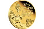 Дональд Дак улыбается на золотых и серебряных монетах