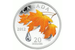 Кристалл Сваровски на кленовом листе канадской монеты