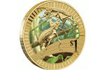 Кто является дизайнером монеты «Жук-носорог»?
