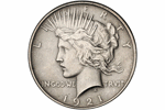 Буква «V» в слове TRUST на монетах США
