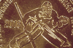 На монетах Приднестровья изображены фигуристка и хоккеист