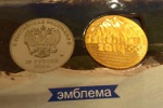 Что за желтые олимпийские монеты?