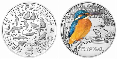 Зимородок удобно устроился на австрийской монете