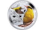 На серебряной монете изображена иволга