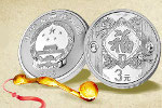 В Китае изготовили первую в 2015 г. инвестиционную монету из серебра