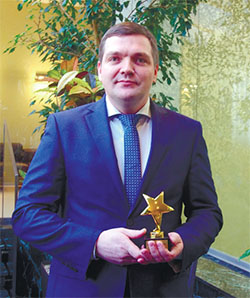 Дмитрий Шишкин с наградой от компании MDM Дмитрий Шишкин с наградой от компании MDM