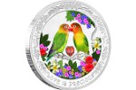 Монета «Птицы любви» украшена кубическим цирконием