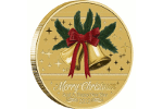 Кто является дизайнером монеты «Счастливого Рождества»?